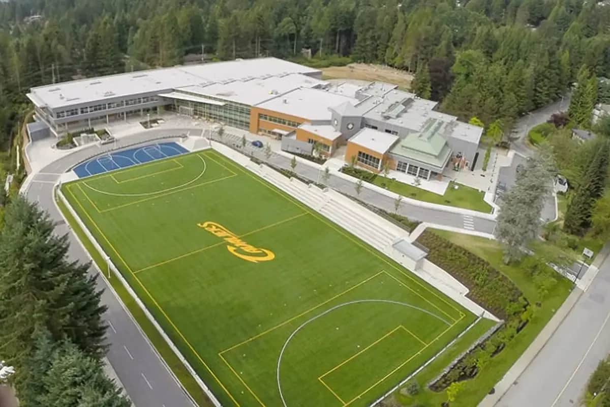 a sports field and a building